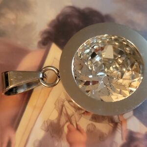 Elegant Silver Pendant with Crystal